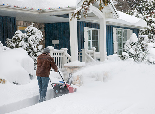 Monnick Supply - Removing snow off the driveway